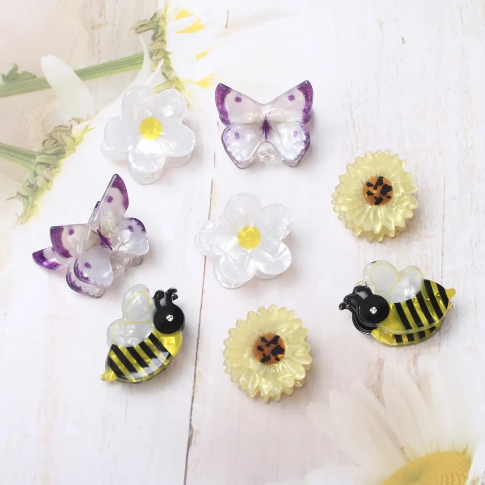 Confezione da 4 fermagli per capelli margherita piccoli artigli per capelli per donne ragazze fiore farfalla acrilico moda granchio per morsetti per capelli accessori per capelli