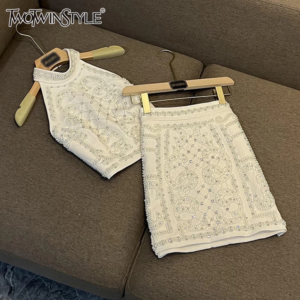 TWOTWINSTYLE Set di due pezzi di lusso per donna Girocollo senza maniche Top a vita alta Gonne Chic Set femminile KVE 534520 KSK 534521