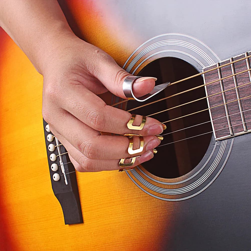 Plettri per Dita e Pollice per Chitarra