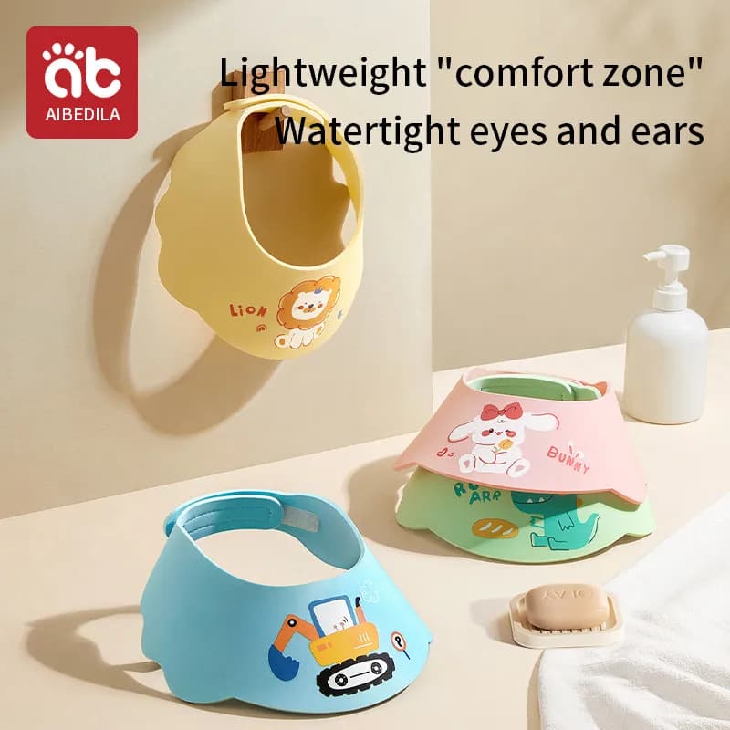 AIBEDILA Children's shower head Adjustable waterproof ear protection Shampoo cap Children's bathroom head accessories Baby care accessory