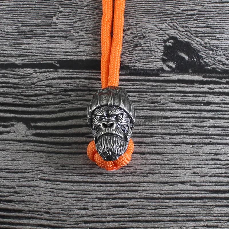 Gorilla Head scultura coltello in ottone ciondolo con perline EDC ottone antico accessori Paracord fai da te ciondolo con fibbie appese