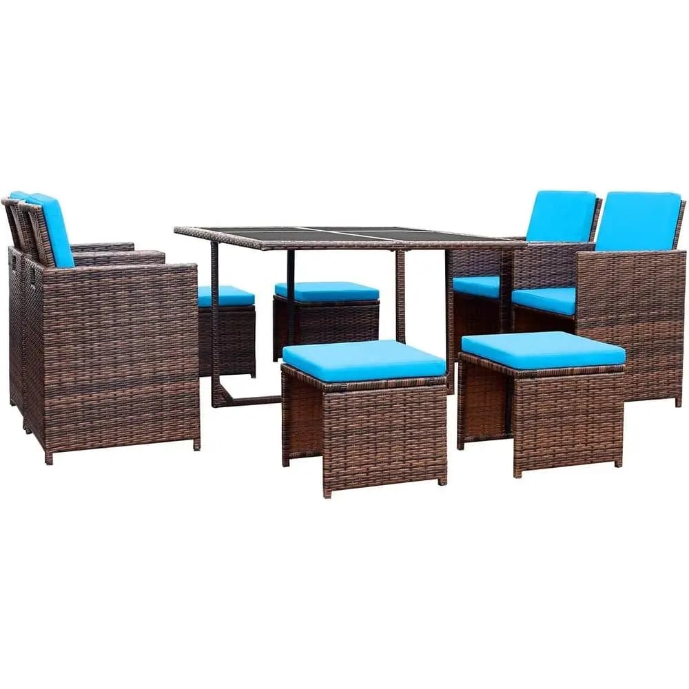 Set da Pranzo da Esterno Salvaspazio in 9 Pezzi con Sedie in Rattan Imbottite e Tavolo in Vetro Blu