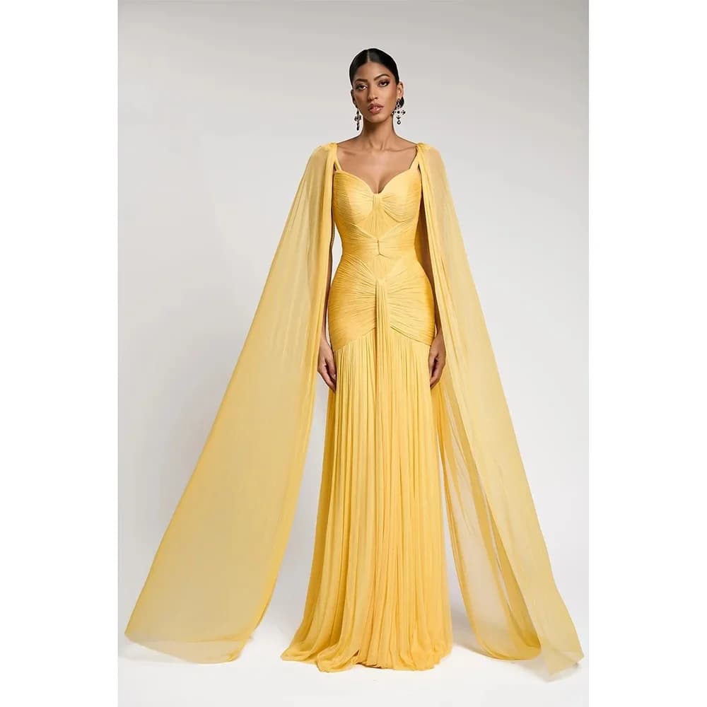 Customized strapless floor-length gown with premium texture and fresh hue. Smooth draping skirt and fine tailoring show gentle a