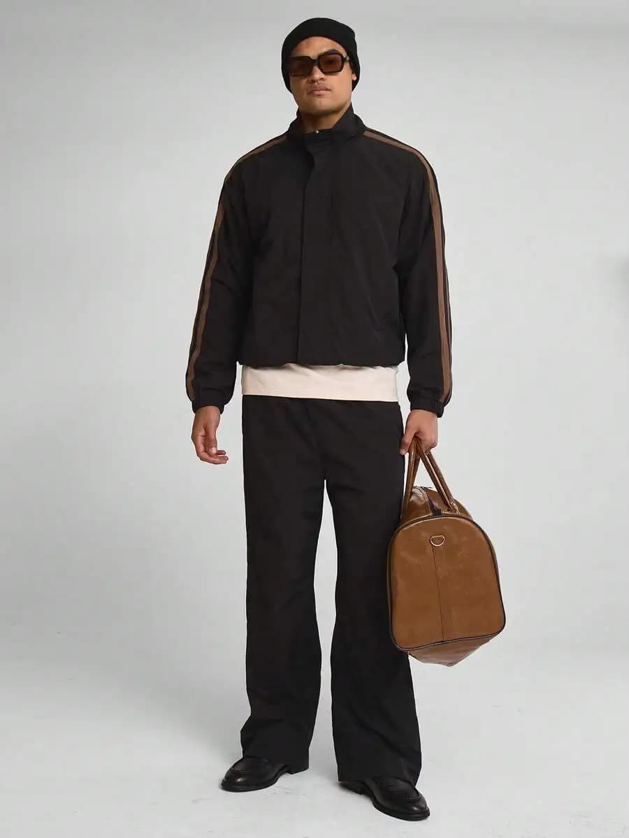 Pantaloni neri oversize a gamba larga con strisce laterali a contrasto e vita elasticizzata per la primavera/estate