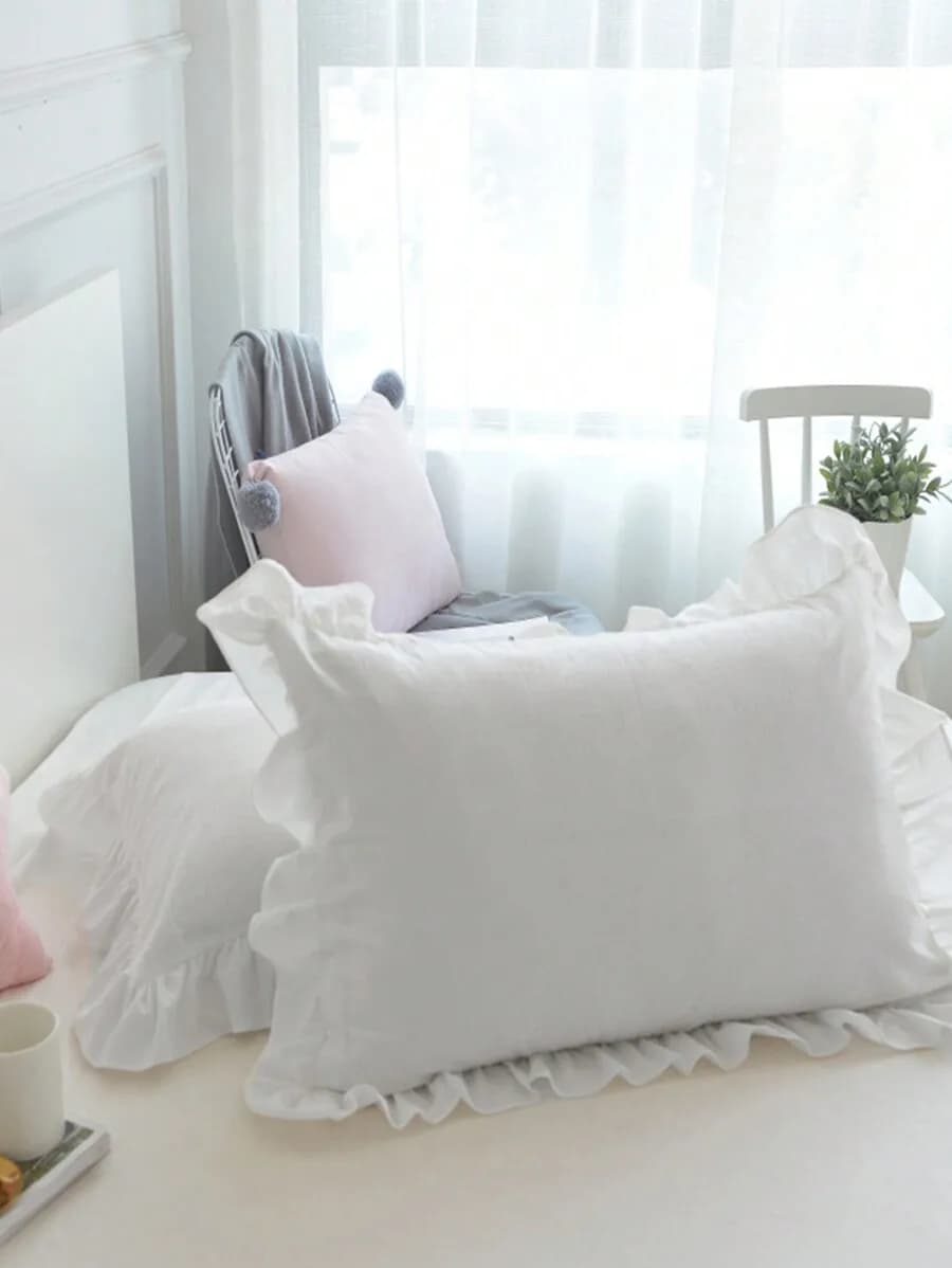 White pillow case with soft curled edge for bedroom furniture