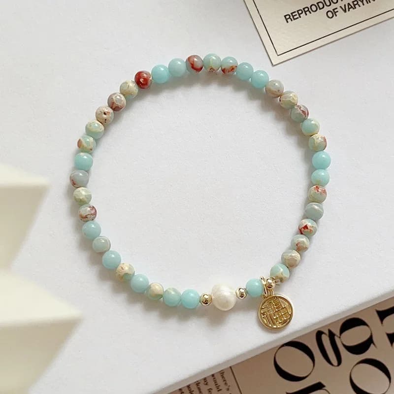 Nuovo pino imperiale per le donne con fascino della fortuna, lucchetto Ruyi, fibbia della pace, semplice braccialetto elastico a catena sottile