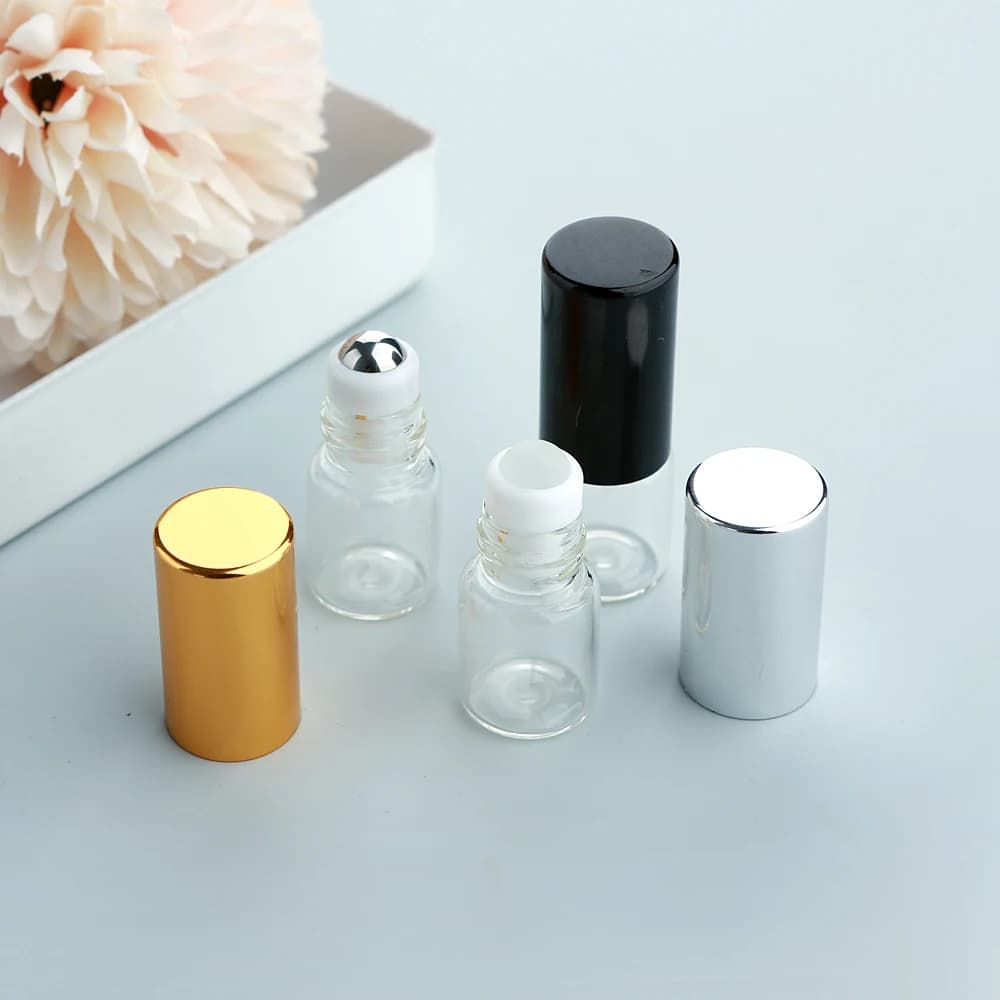 100 flaconi roll-on in vetro trasparente da 2 ml con testine spray in alluminio, dispenser portatili di profumo/viaggio per oli essenziali.