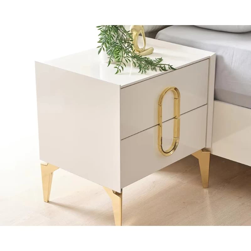 Comodino moderno di lusso a due cassetti con maniglie e gambe dorate