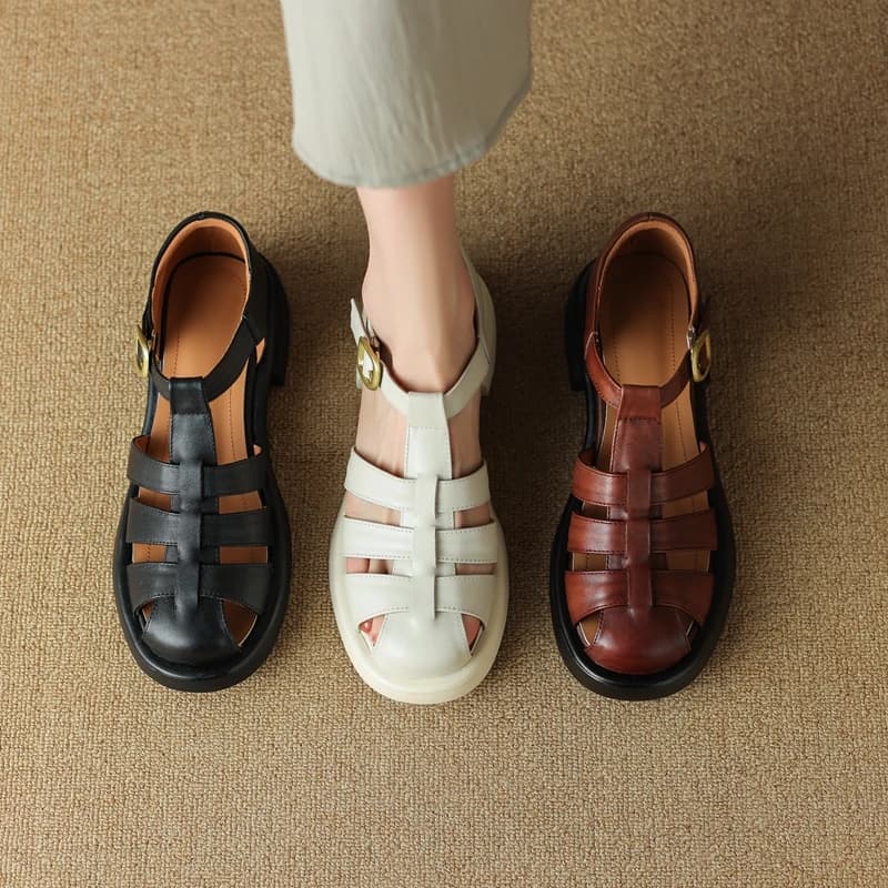 I nuovi sandali da donna grandi con tacco medio in pelle bovina a testa tonda di Kaky sandali romani scarpe moda Baotou