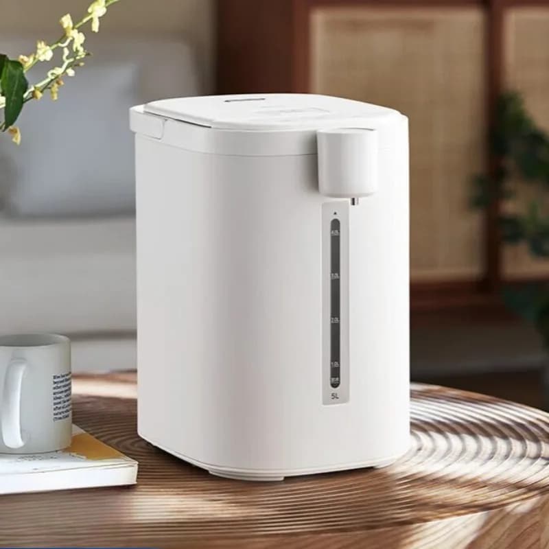Midea electric kettle with integrated insulation function, glass inner liner, intelligent constant temperature control.