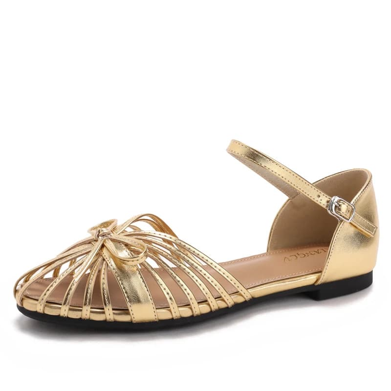 New style flat sandals with single buckle and thin straps, featuring a bow and hollowed-out buckle strap