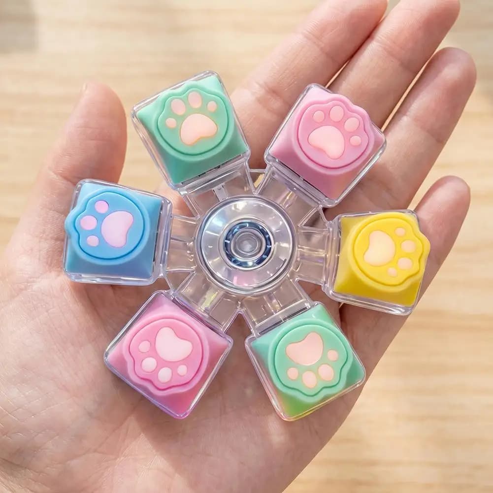 Portachiavi a forma di zampa di gatto con luce LED, giocattolo antistress per tastiera meccanica, per alleviare l'ansia e lo stress delle dita.