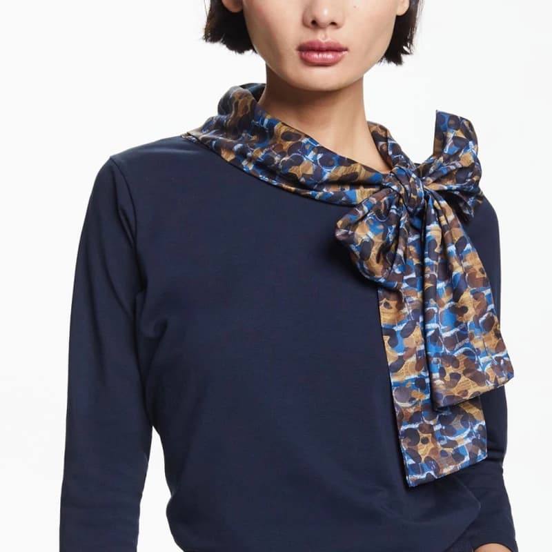 T-shirt da donna nuova moda elegante casual papillon allentato top femminile primavera estate versatile abbigliamento da strada per pendolarismo da donna