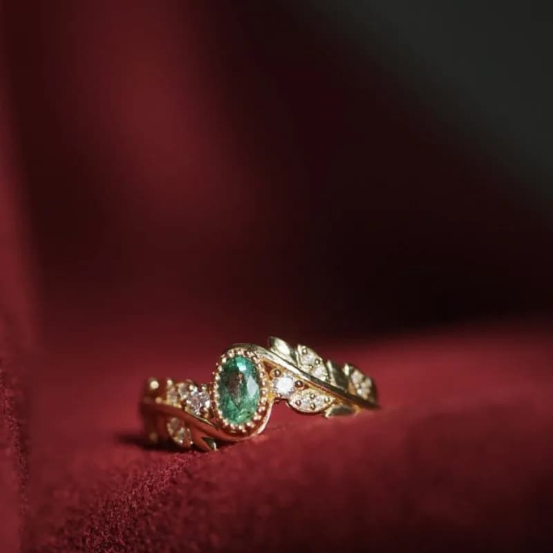 Anello con ramo di ulivo di lusso leggero con diamanti in oro 18 carati con smeraldo naturale "Street Xi Yan".