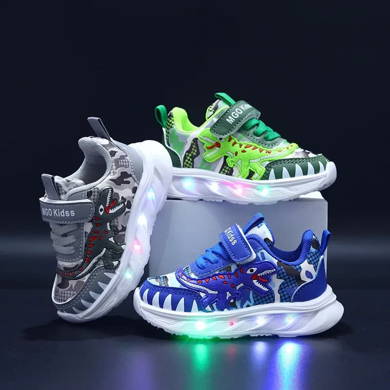 Scarpe sportive per bambini nuove primaverili Dinosauro del fumetto Scarpe leggere a LED per bambini Suola morbida Scarpe da ginnastica causali per ragazzi 2-6 anni