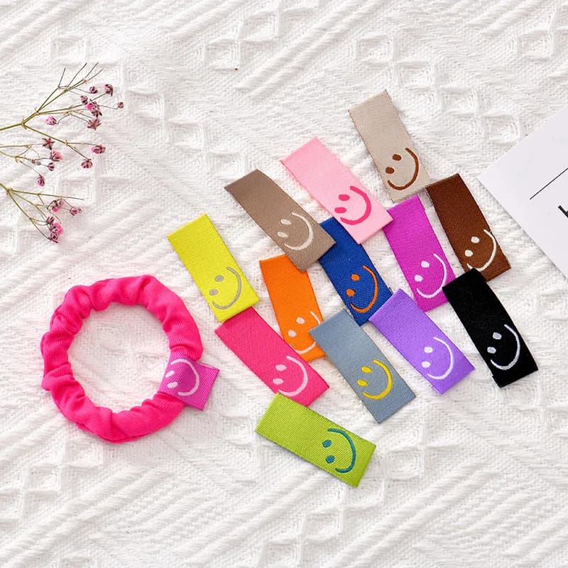 Etichette per ricamo sorriso per etichette per indumenti fatte a mano Borse per la cura dei vestiti per bambini Forniture fai da te Accessori per cucire 1,5x4 cm