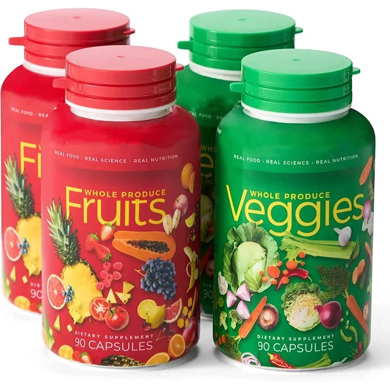 Vitamin supplement in fruit and vegetable capsules filled with vitamins and minerals