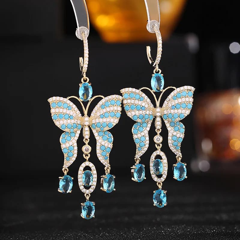 Orecchini pendenti a farfalla lunghi con zirconi micro-incastonati, stile lusso leggero, super eleganti e raffinati, con lavorazione artigianale.
