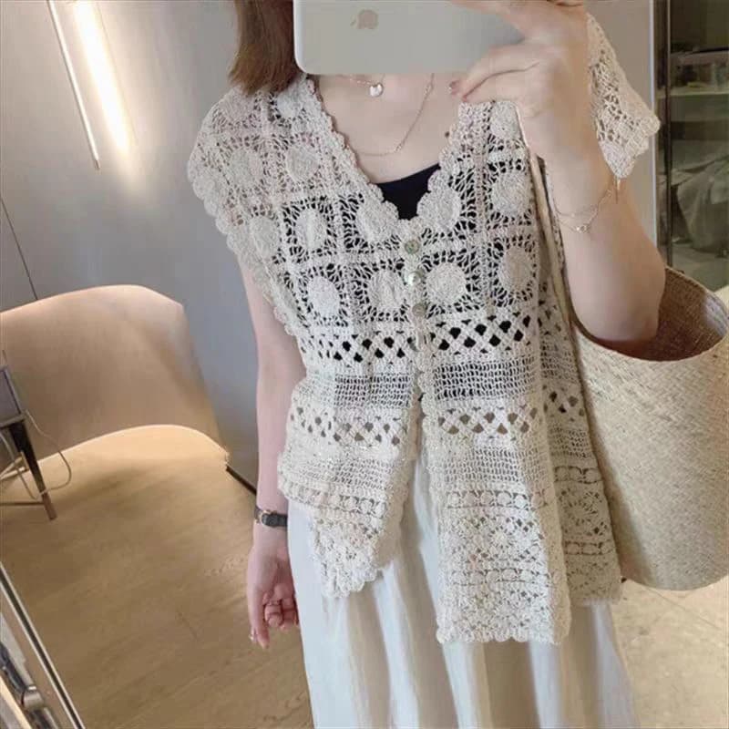 Camicia da donna senza maniche all'uncinetto Moda coreana da donna con gancio fiore scava fuori camicetta con scollo a V canottiere lavorate a maglia