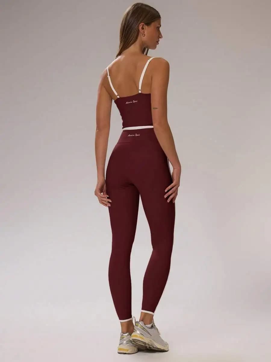 Set con top corto aderente con bordo a contrasto e leggings a vita alta per allenamento in palestra, yoga, pilates