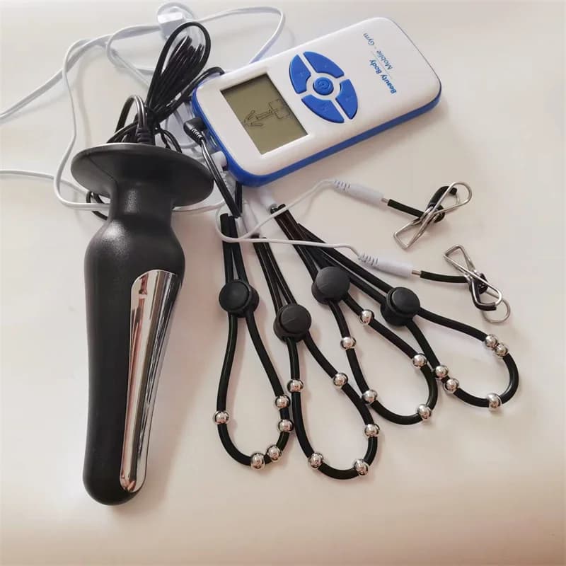 8 modalità Scossa elettrica Anelli per il pene in silicone Allenatore del pene maschile Massaggio Testicolo Stimolazione Capezzoli Clip Spina anale Giocattoli del sesso Uomini