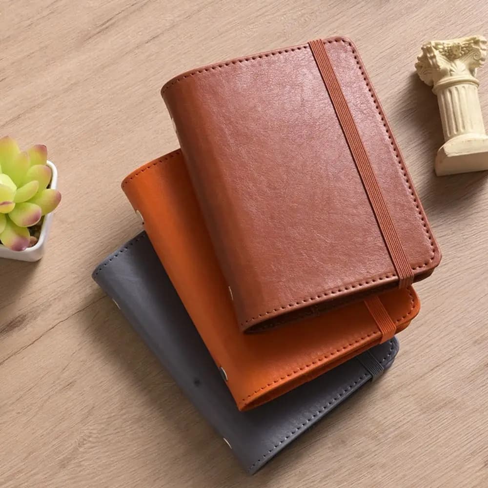 Semplice raccoglitore in pelle A8 Notebook portatile linea vuota Mini diario pianificatore Programma 5 fori Blocco note Diario