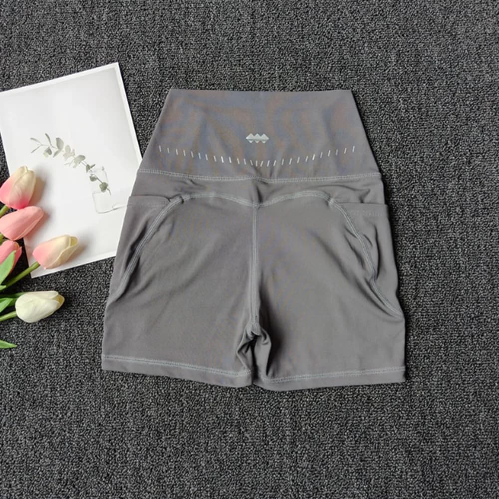 Pantaloncini sportivi estivi con tasche, pantaloncini da allenamento a vita alta ad asciugatura rapida con effetto push-up, pantaloncini da ciclismo da donna