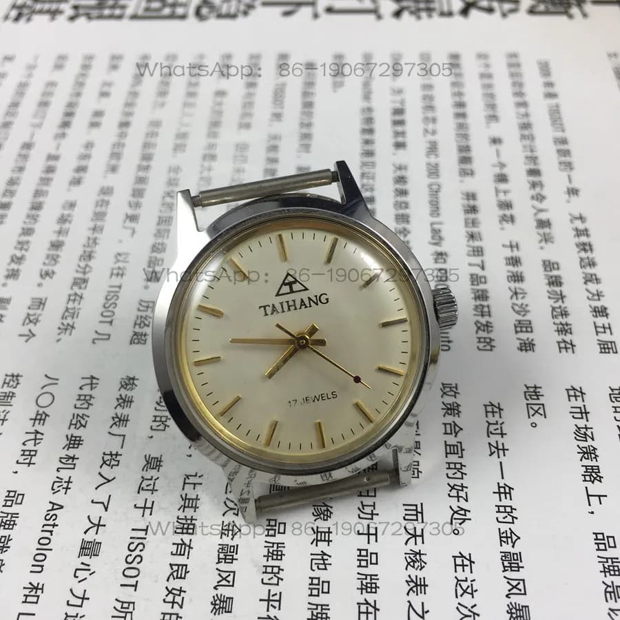 Orologio meccanico manuale a carica manuale con quadrante in acciaio, marca Taihang, prodotto dalla fabbrica di orologi di Shijiazhuang, diametro 35mm.