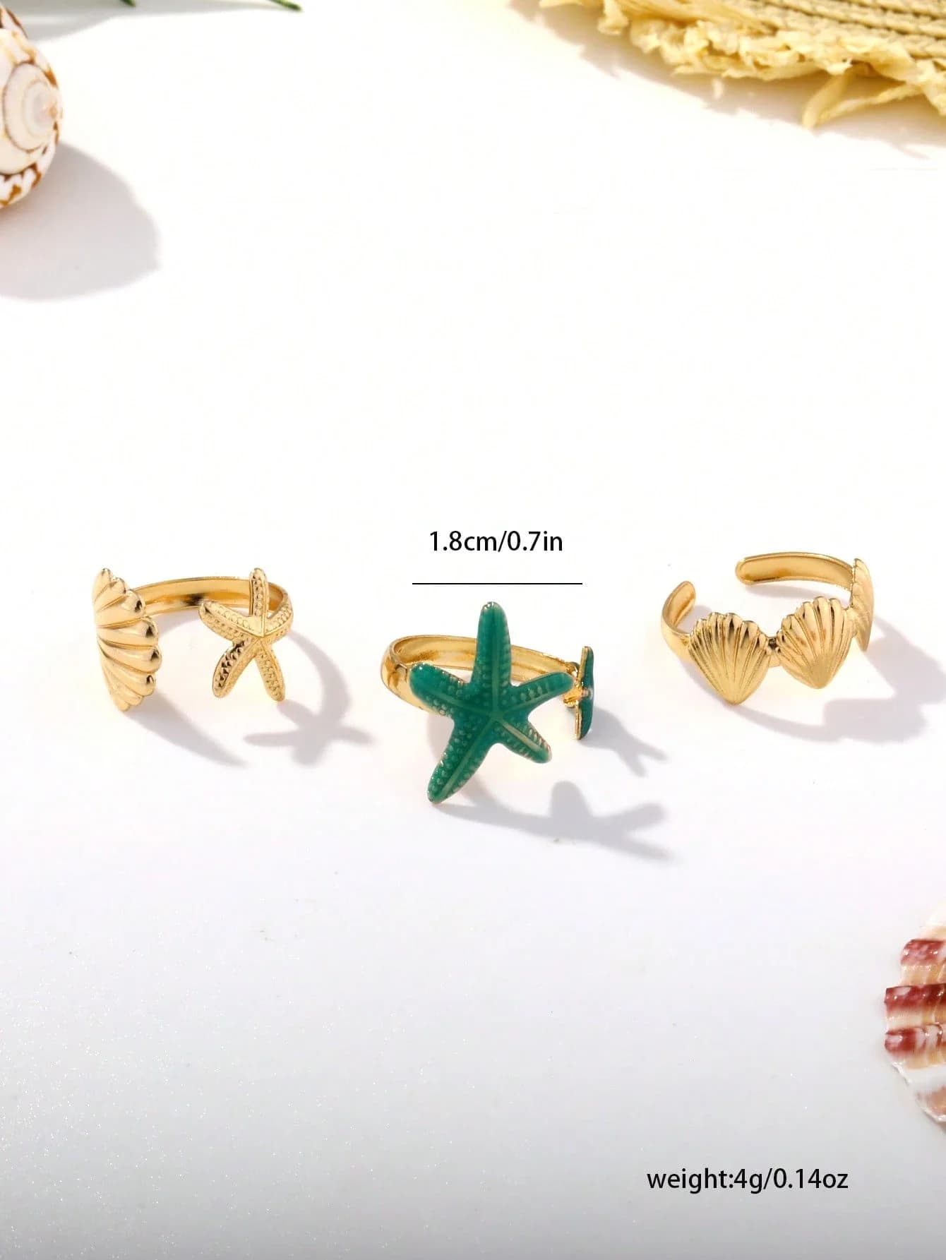 Set di anelli aperti a tema oceano con stelle marine e conchiglie blu