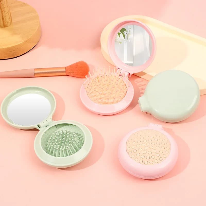 Nuovo mini pettine pieghevole 3 in 1 - Spazzola per massaggio con cuscino d'aria con specchio, ultra portatile per borsa e viaggio, simpatico strumento per capelli da donna