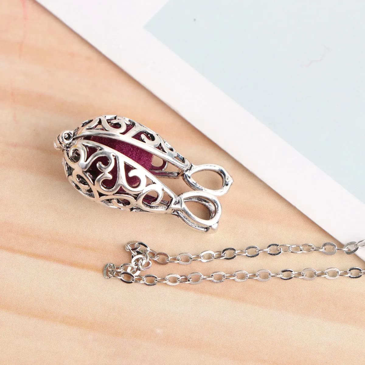 1Pcs Aromatherapy Ball Necklace Silver Hollowed-Out Pendant Cotton Pelelith Creative Neck Chain for Birthday