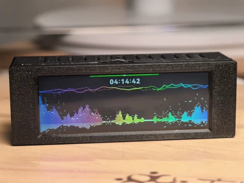 Orologio con pagine che si voltano stampate in 3D, spettro musicale, Wi-Fi integrato per la connessione in rete