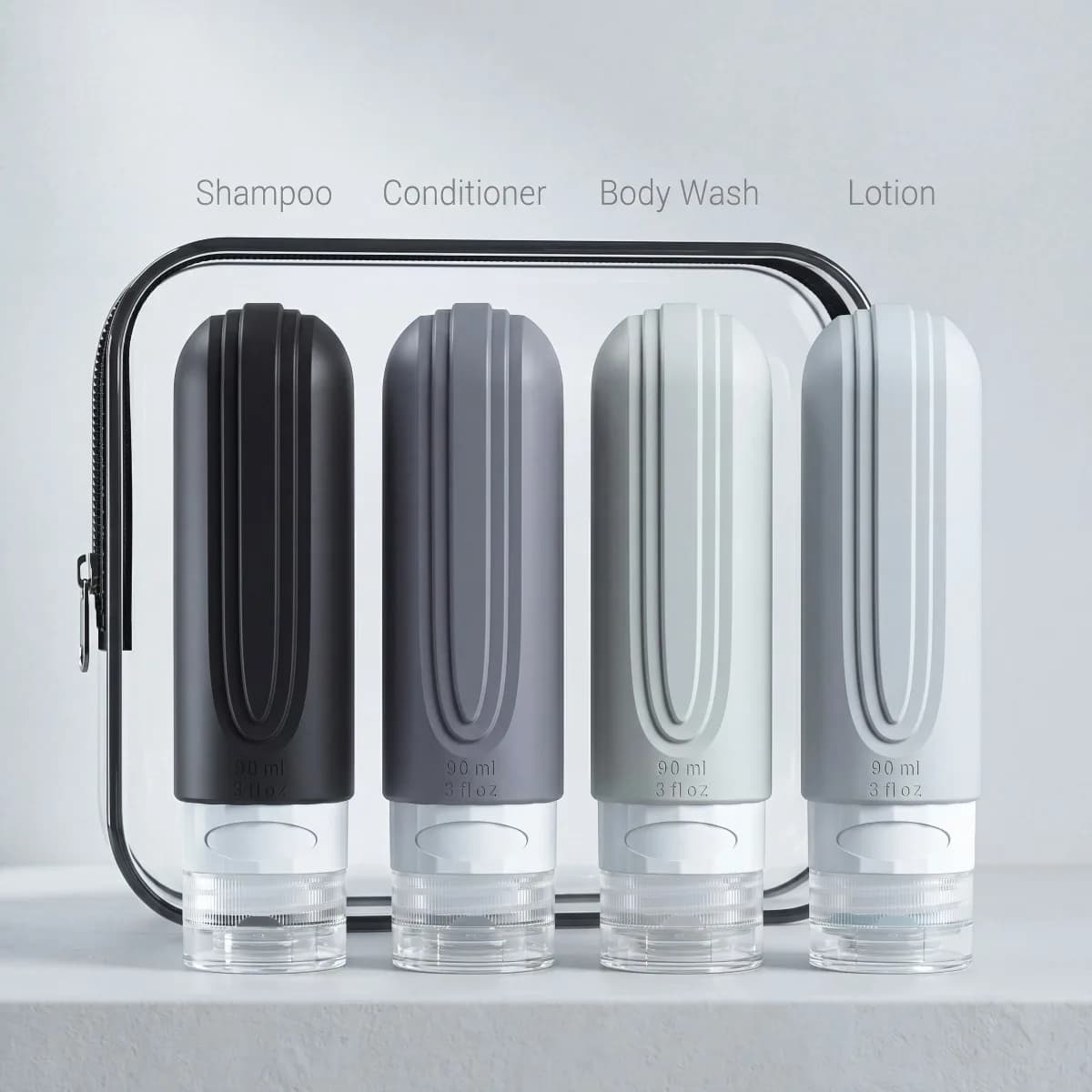 4-piece TSA-approved silicone bottle set (3oz), leakproof & refillable. Includes spray bottle & soap dispenser. Perfect for travel, bathroom & gifting