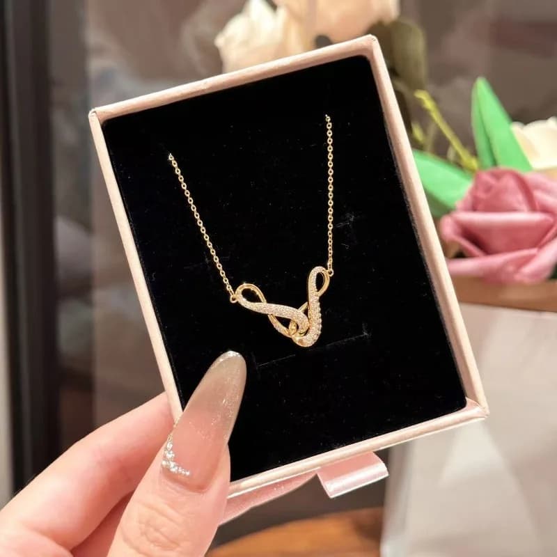 Collana con Simbolo dell'Infinito, Lusso Discreto, Design di Nicchia, Catena per Clavicola di Alta Gamma, Gioiello Classico Raffinato e alla Moda