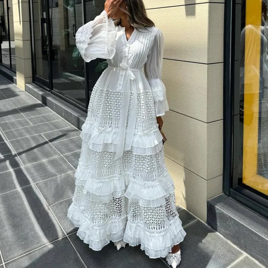 Elegante abito in pizzo scavato con scollo a V maniche lunghe svasate vintage fasciatura chic abiti lunghi a trapezio abbigliamento da strada francese