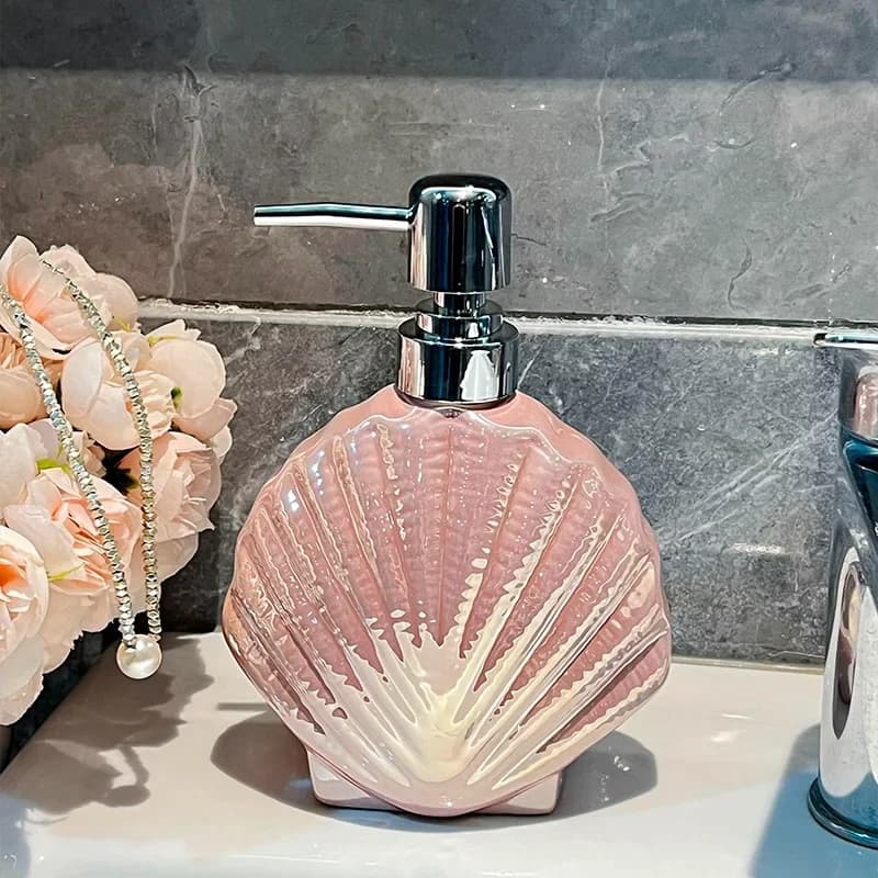 Bottiglia con pressa in ceramica Accessori per riporre il bagno Bottiglia per lozione Dispenser di sapone Sottobottiglia con guscio rosa brillante