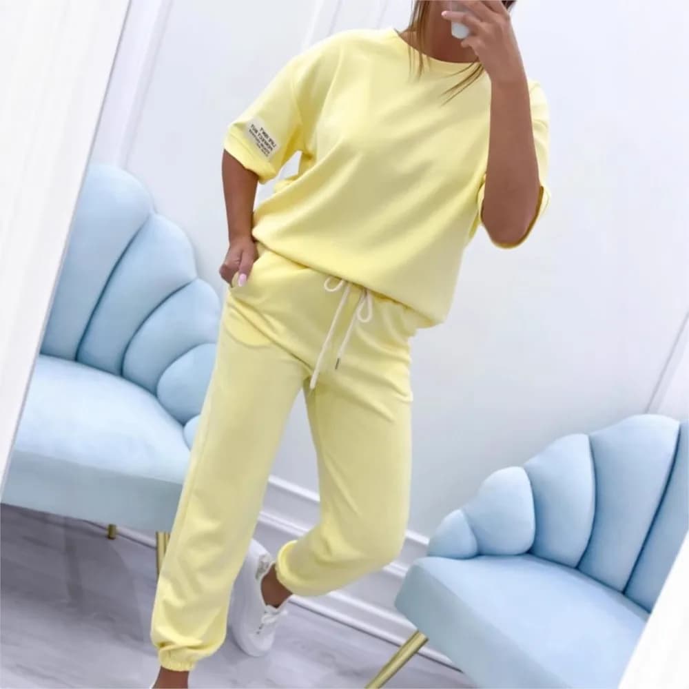 Pantaloni casual giornalieri da donna Set 2025 T-shirt a maniche corte con scollo tondo moda estiva + pantaloni con risvolto con lacci Set di due pezzi Abbigliamento sportivo