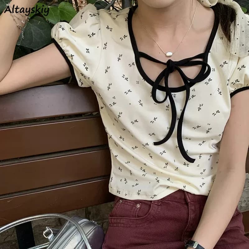 Magliette floreali magliette Casual a maniche corte da donna Slim Summer All-match Girlish letterario Design puro elegante fiocco tenero Lace-up