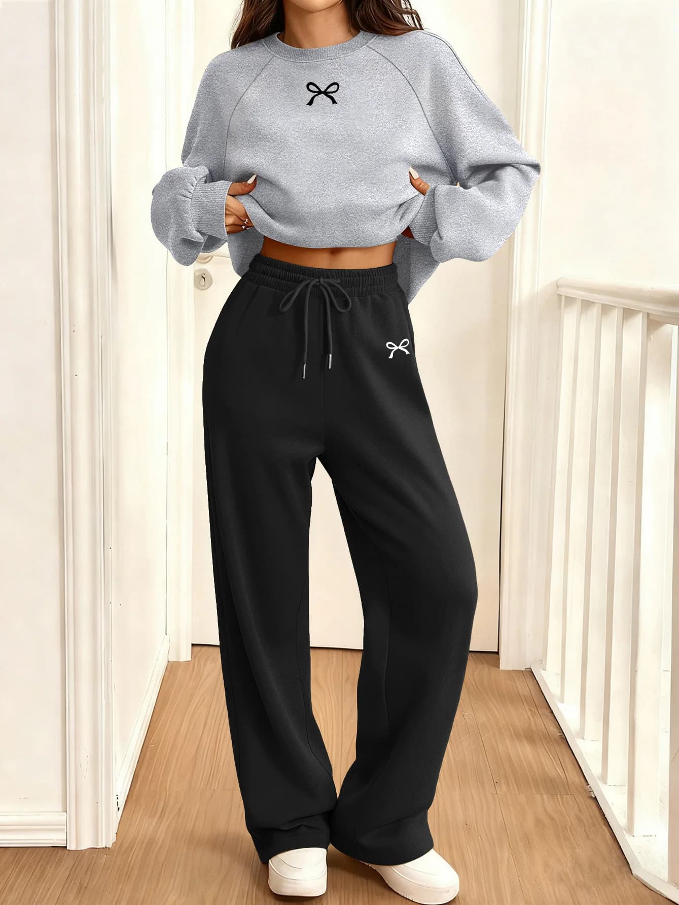 2026 Autunno e Inverno Moda Arco Stampe grafiche Set allentato girocollo Abbigliamento sportivo Tuta da jogging fitness in due pezzi da donna