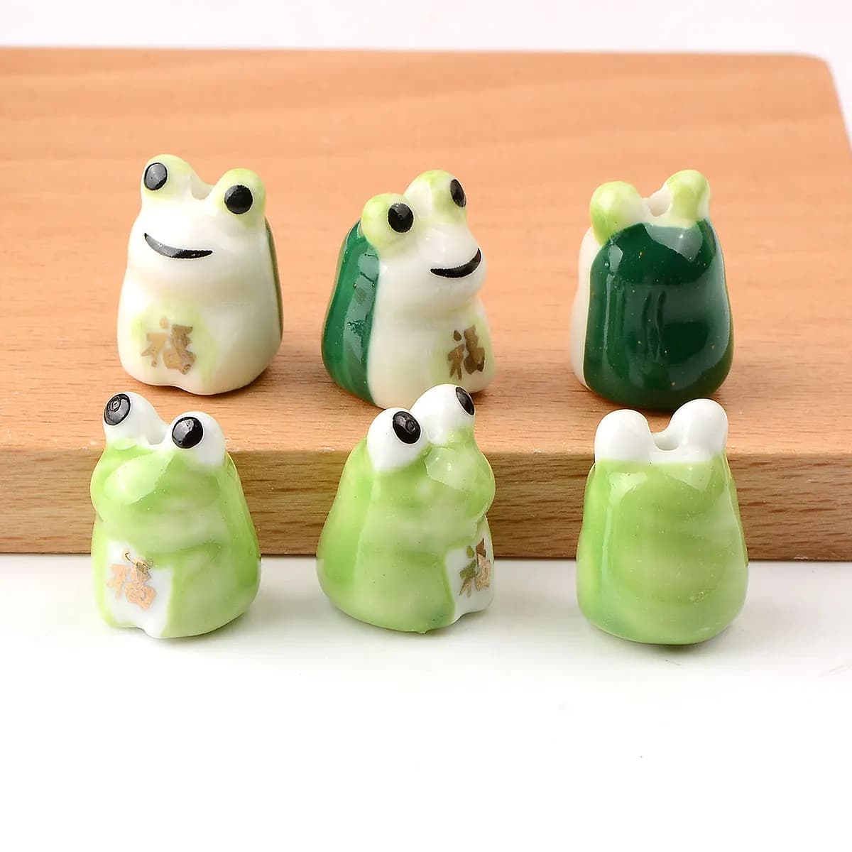4 pz 1.3x1.8 cm Creativo Fatto A Mano Dipinto Rana Perline di Ceramica Perline Del Distanziatore per la Produzione di Gioielli FAI DA TE Braccialetto Del Pendente di Fascino