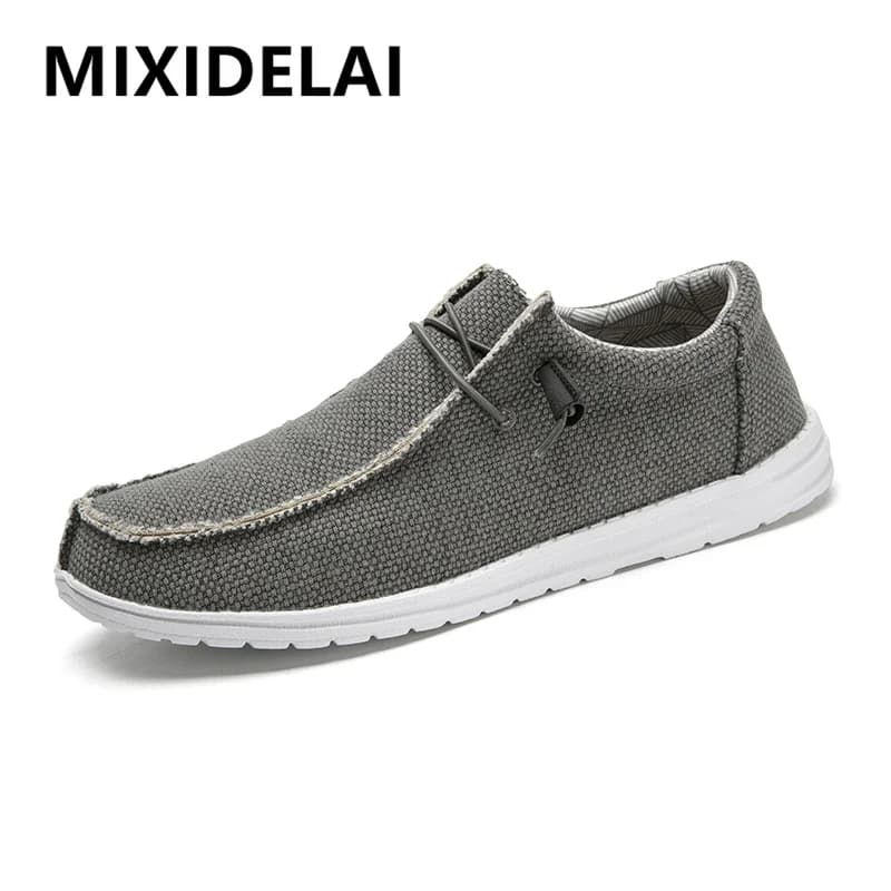 Nuove scarpe da ginnastica da uomo leggere scarpe da uomo di grandi dimensioni mocassini di tela scarpe da esterno primaverili scarpe da guida traspiranti comode da uomo