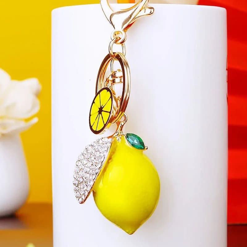 Nuovo simpatico strass simulazione frutta piccolo portachiavi al limone cartone animato borsa da donna portachiavi per auto anello K5121