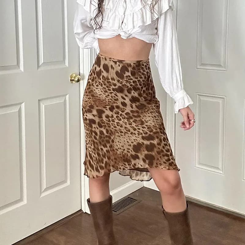 Gonna a mezza lunghezza in rete con stampa leopardata, stile street, design a vita bassa, effetto snellente, per ragazza dallo stile audace.
