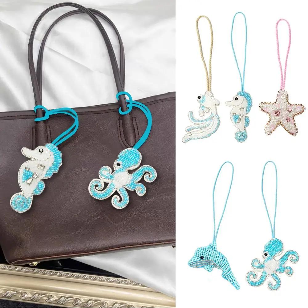 Cordino per borsa con perline di strass fatto a mano Vita marina Cavalluccio marino Toppa di delfino di cristallo Portachiavi con corda appesa Decorazione pendente per borsa fai da te