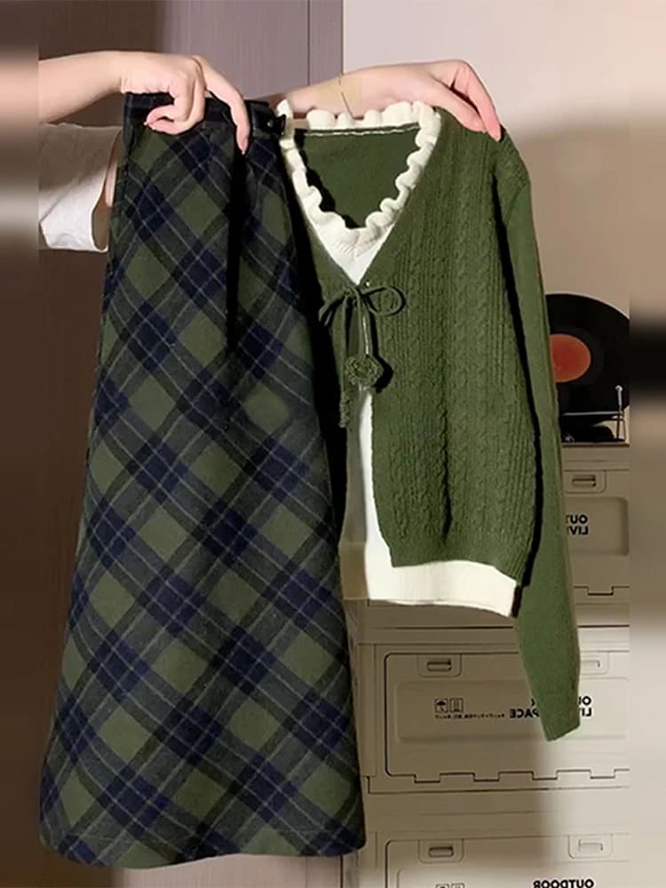 Maglione verde lavorato a maglia e gonna a quadri, completo da donna per la primavera e l'autunno, maniche lunghe, scollo a V, due pezzi.