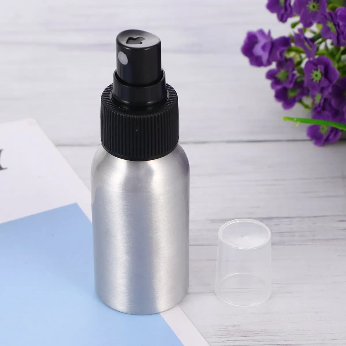 Set of 2 50 ml spray bottles for sun protection, aluminum alloy, empty, rechargeable, portable, leakproof, for travel and kitchen.