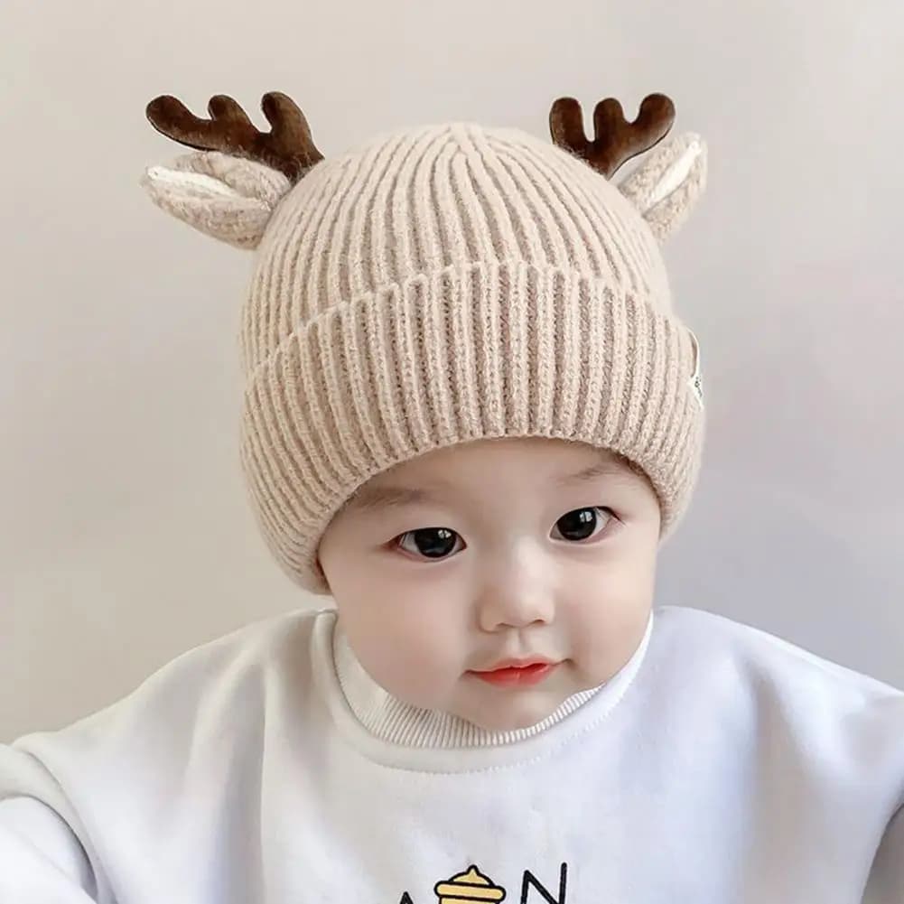 Cappello invernale in peluche per bambini Cappello festivo in corna di renna Cappello invernale lavorato a maglia morbida per Natale Bambino Simpatico design di cervi di Natale