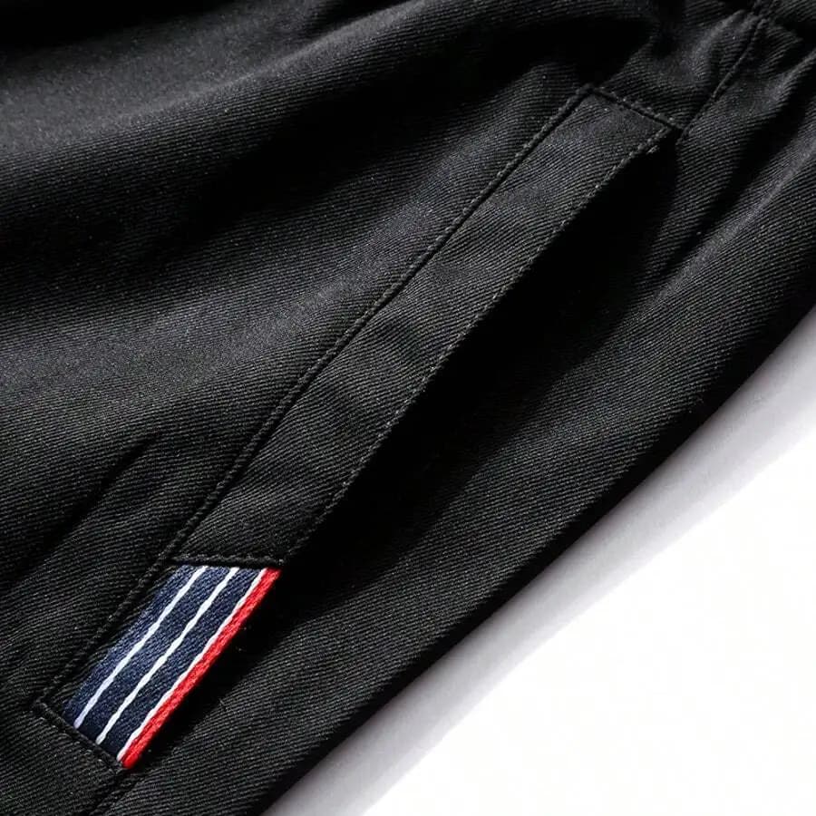 Pantaloncini da uomo leggeri ad asciugatura rapida con elastico in vita, coulisse, tasche laterali e decorazioni a righe