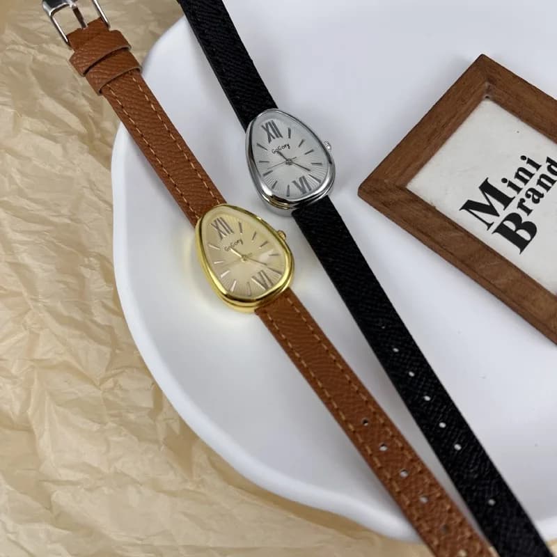 Orologi al quarzo da donna di marca di design Regalo di lusso Orologio da donna con testa di serpente Orologio da polso con cinturino in pelle di moda Montre Femme