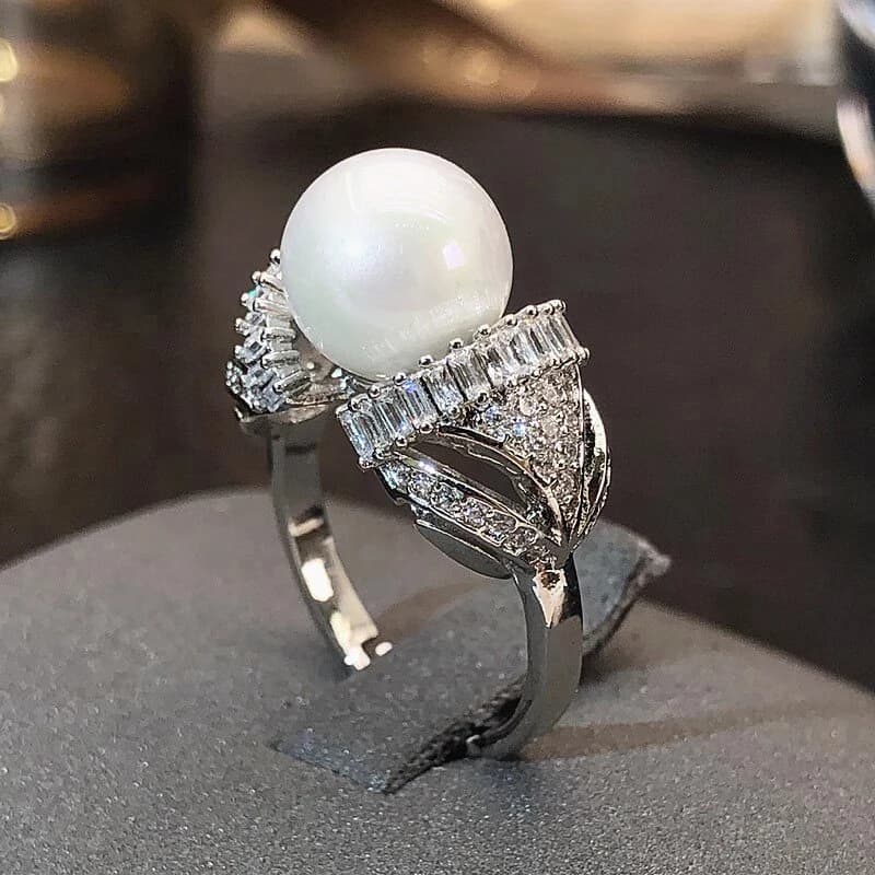 Huitan Elegant ring with simulated pearls for woman, finger jewelry with brilliant cubic zircons for engagement ceremonies, parties, delicate gift